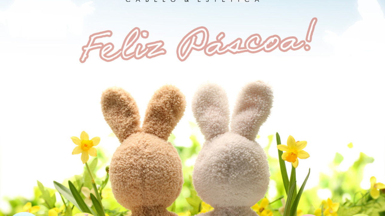 Easter decoration with sugar rabbits,eggs and flowers.